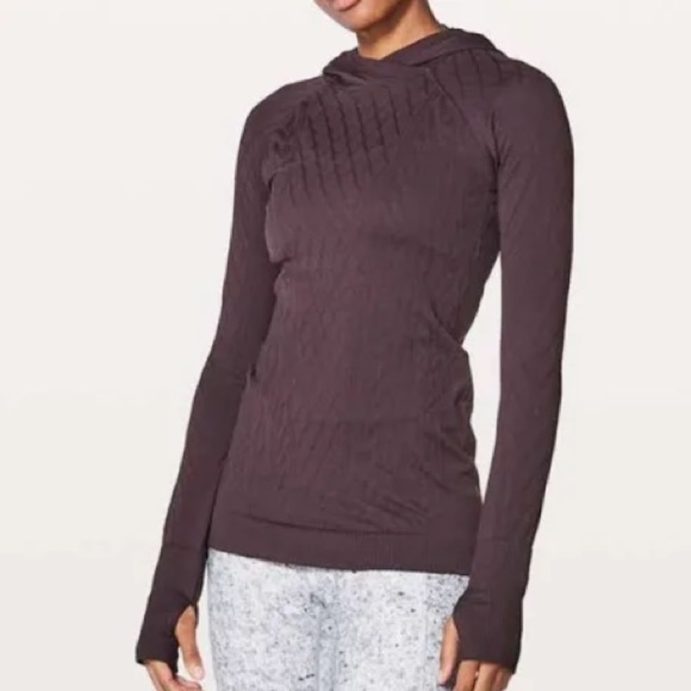 Purple Lululemon top. Size 6 but tag was removed.